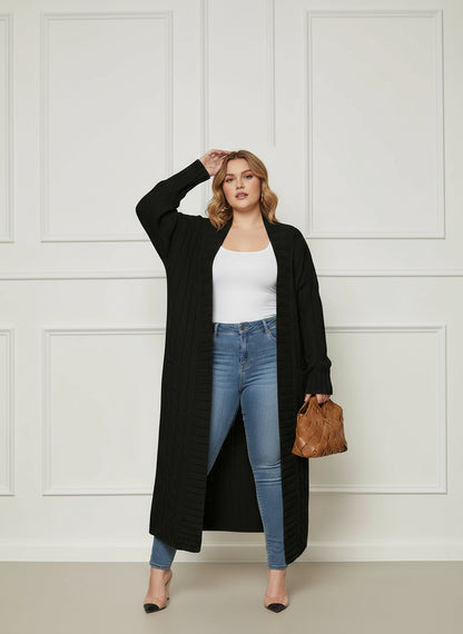 Cardigan long tricoté à poches femme grande taille